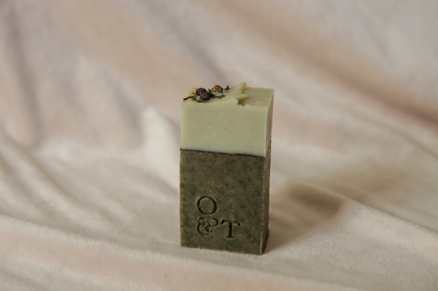 Fern half soap bar, dark green and light green, decorated with peppercorns and nettles