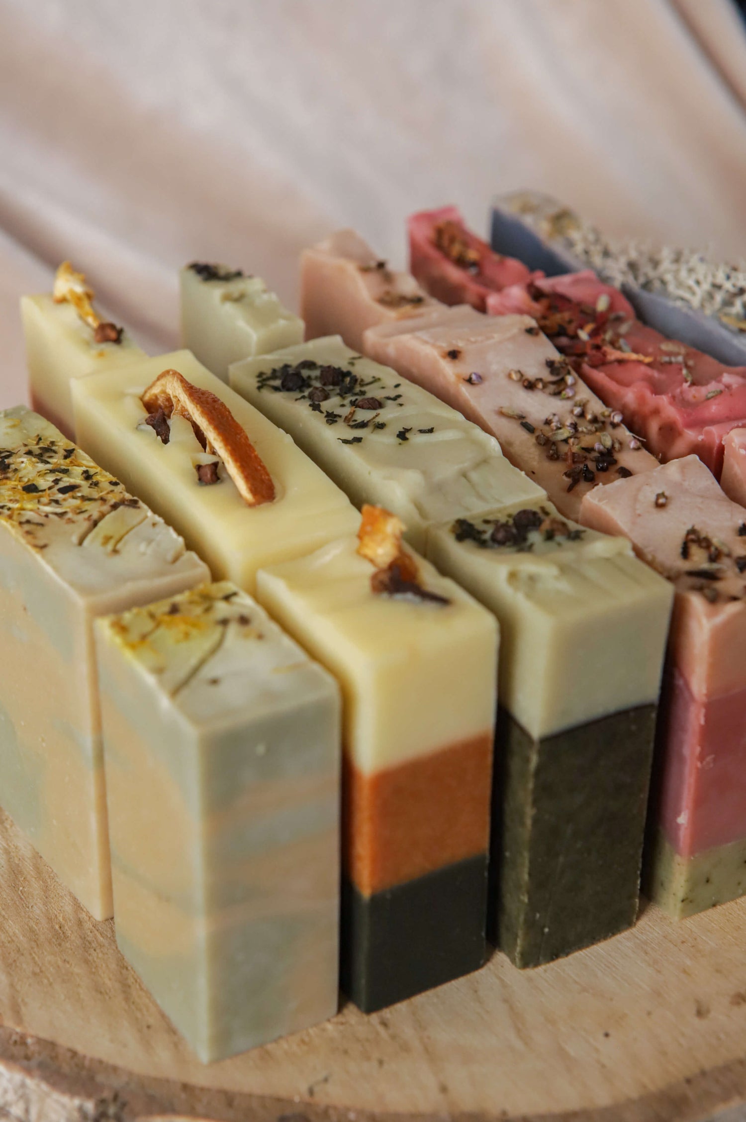 All 6 origin soaps in three different sizes — flora - red, pink/purple - heather, spice - orange, mentha - yellow, fern - green, moss - blue