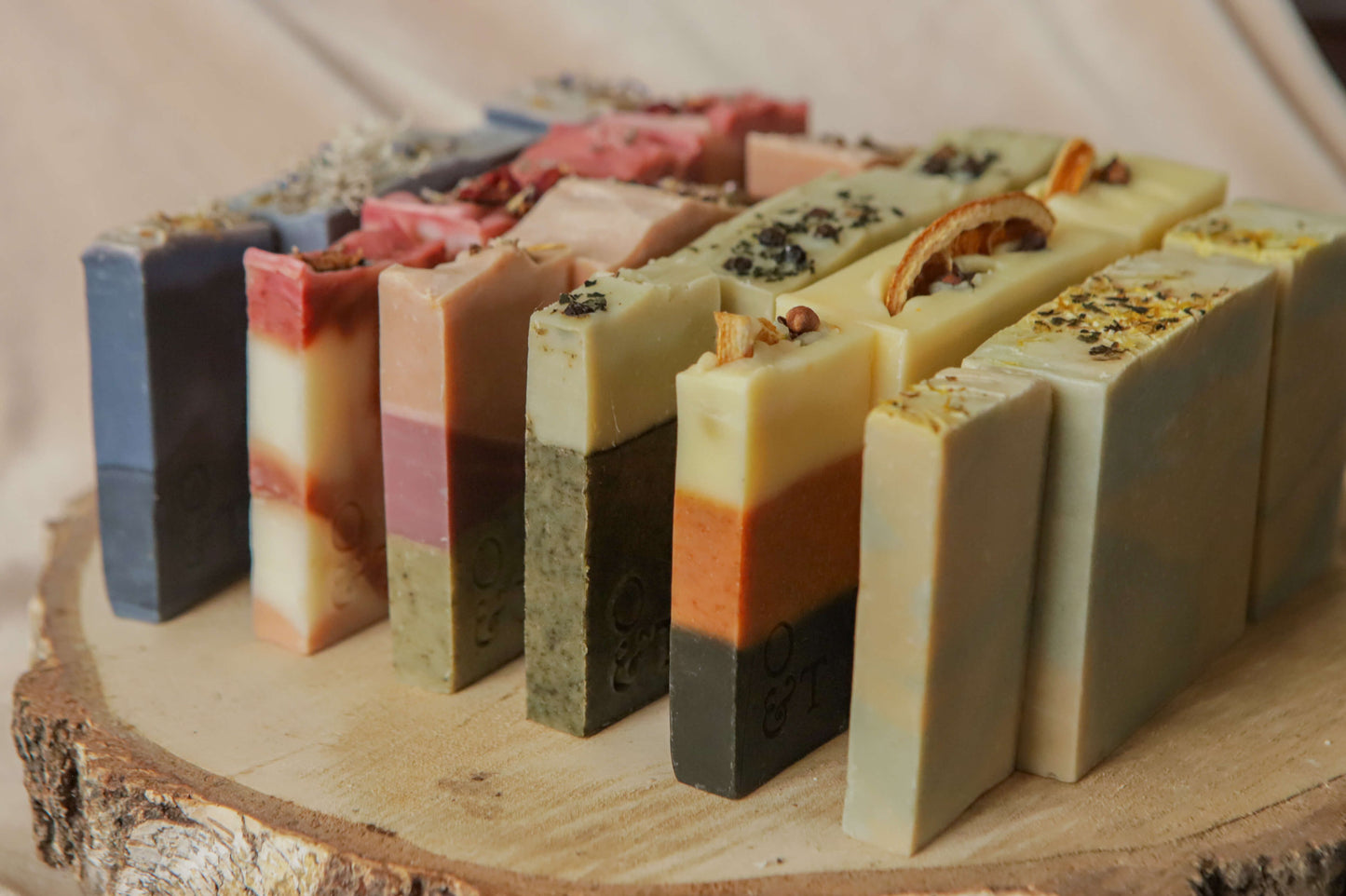All 6 origin soaps in three different sizes — flora - red, pink/purple - heather, spice - orange, mentha - yellow, fern - green, moss - blue