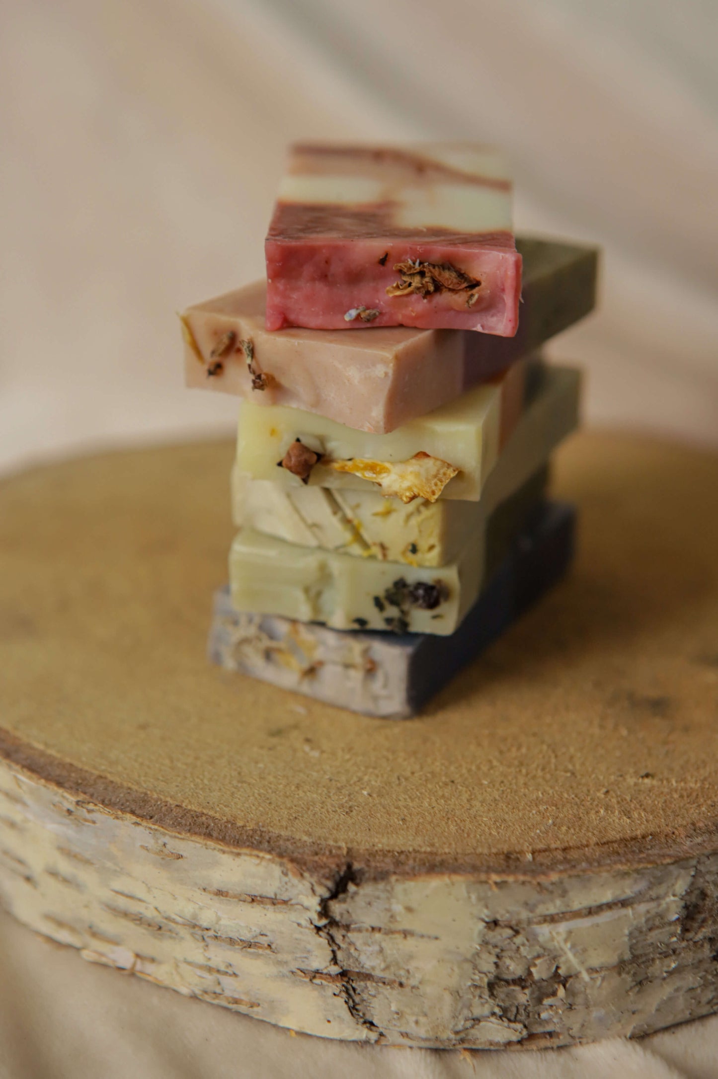 All 6 origin soaps in thin sizes — flora - red, pink/purple - heather, spice - orange, mentha - yellow, fern - green, moss - blue
