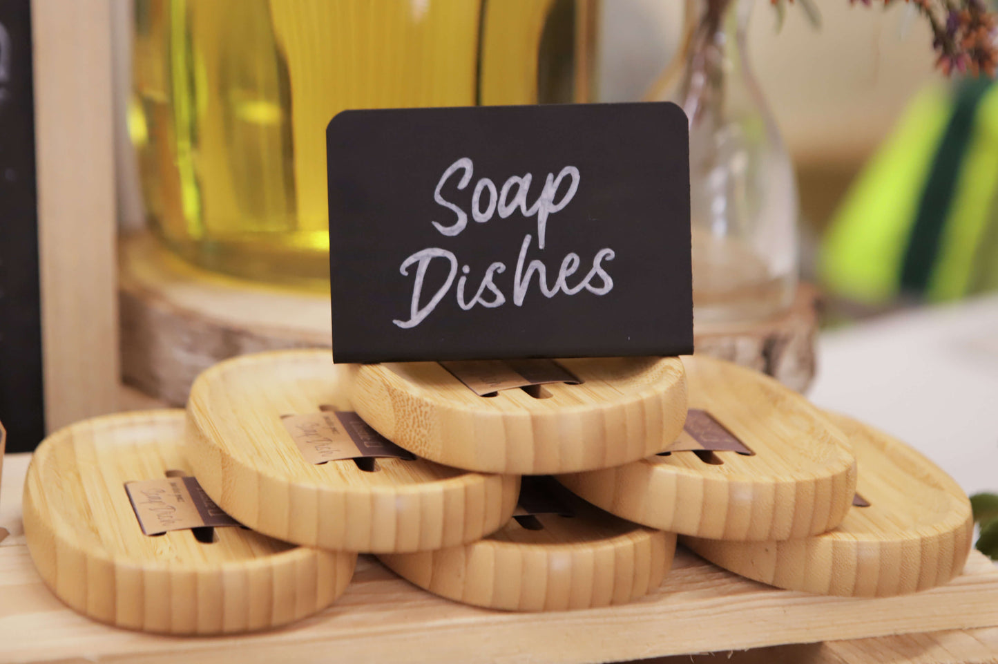 Bamboo oval soap dishes stacked up