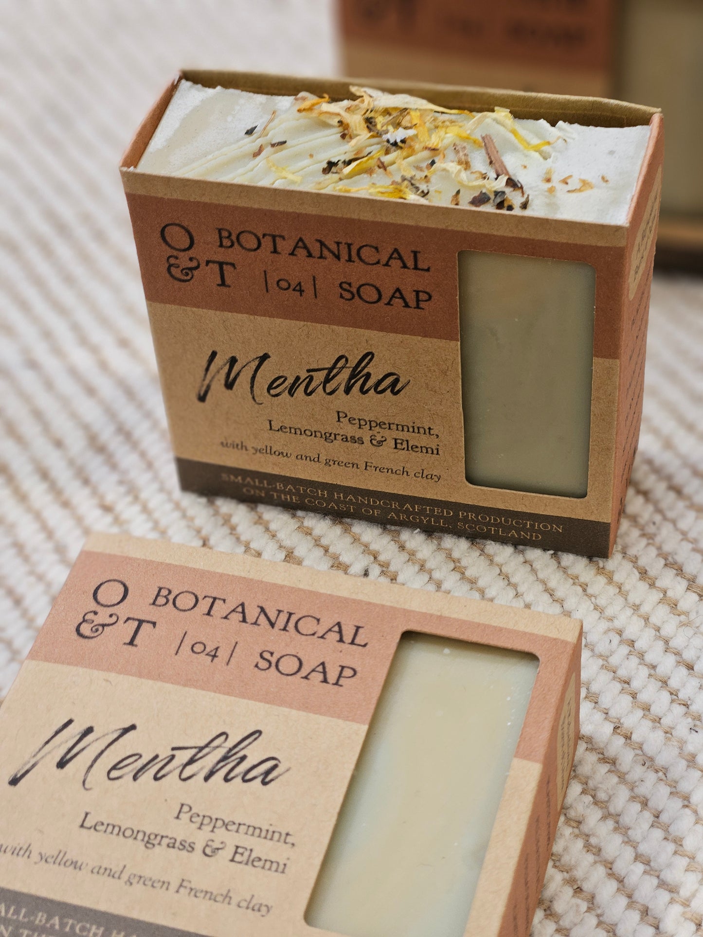 mentha soap bar in packaging with open top box