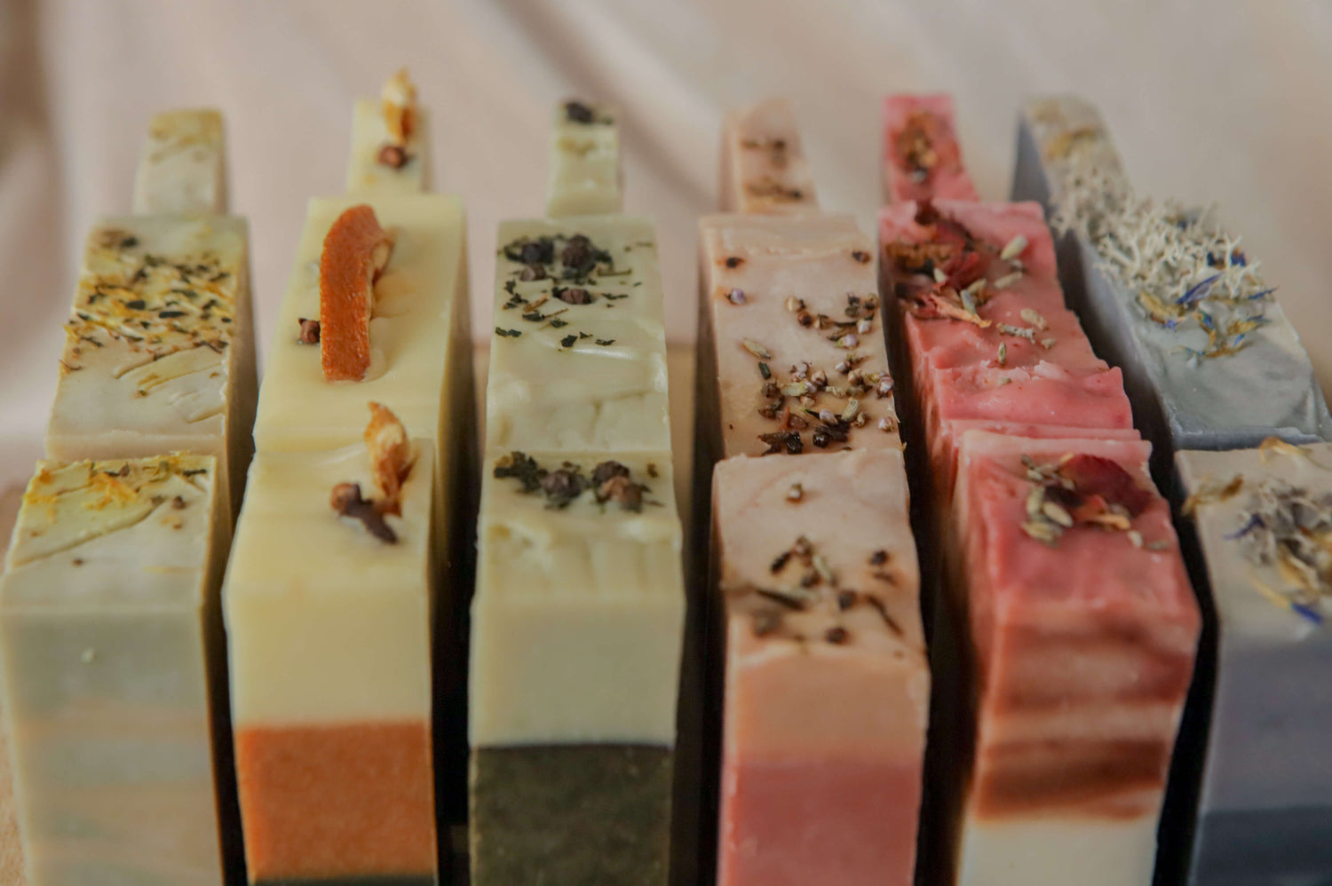 All 6 origin soaps in three sizes — flora - red, pink/purple - heather, spice - orange, mentha - yellow, fern - green, moss - blue