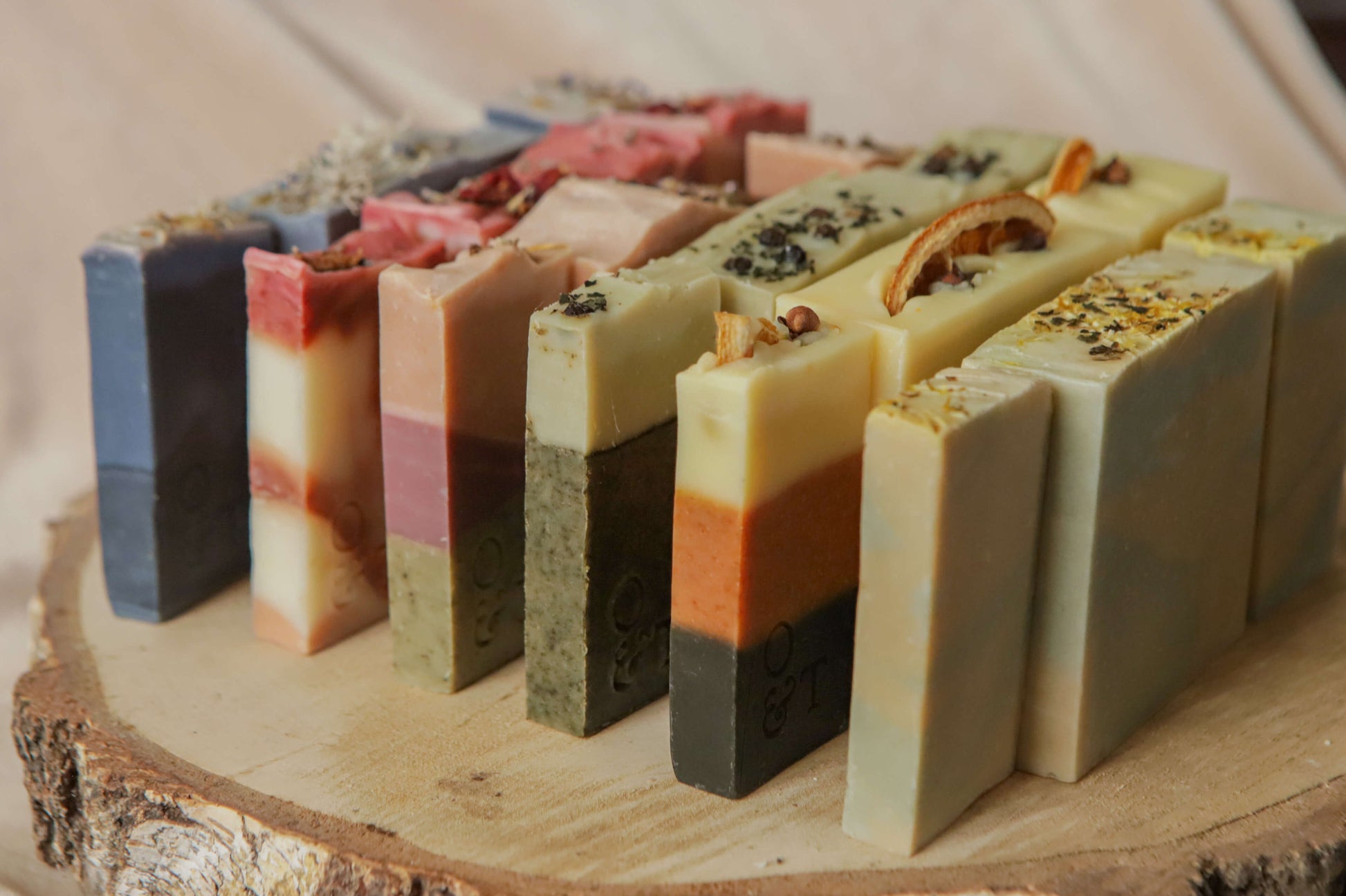 All 6 origin soaps in three different sizes — flora - red, pink/purple - heather, spice - orange, mentha - yellow, fern - green, moss - blue