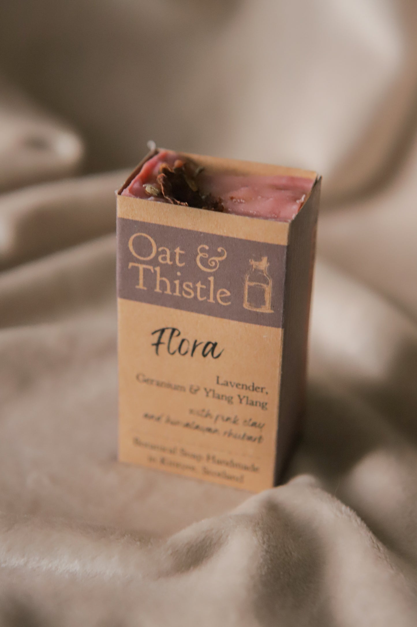 half flora soap bar in packaging