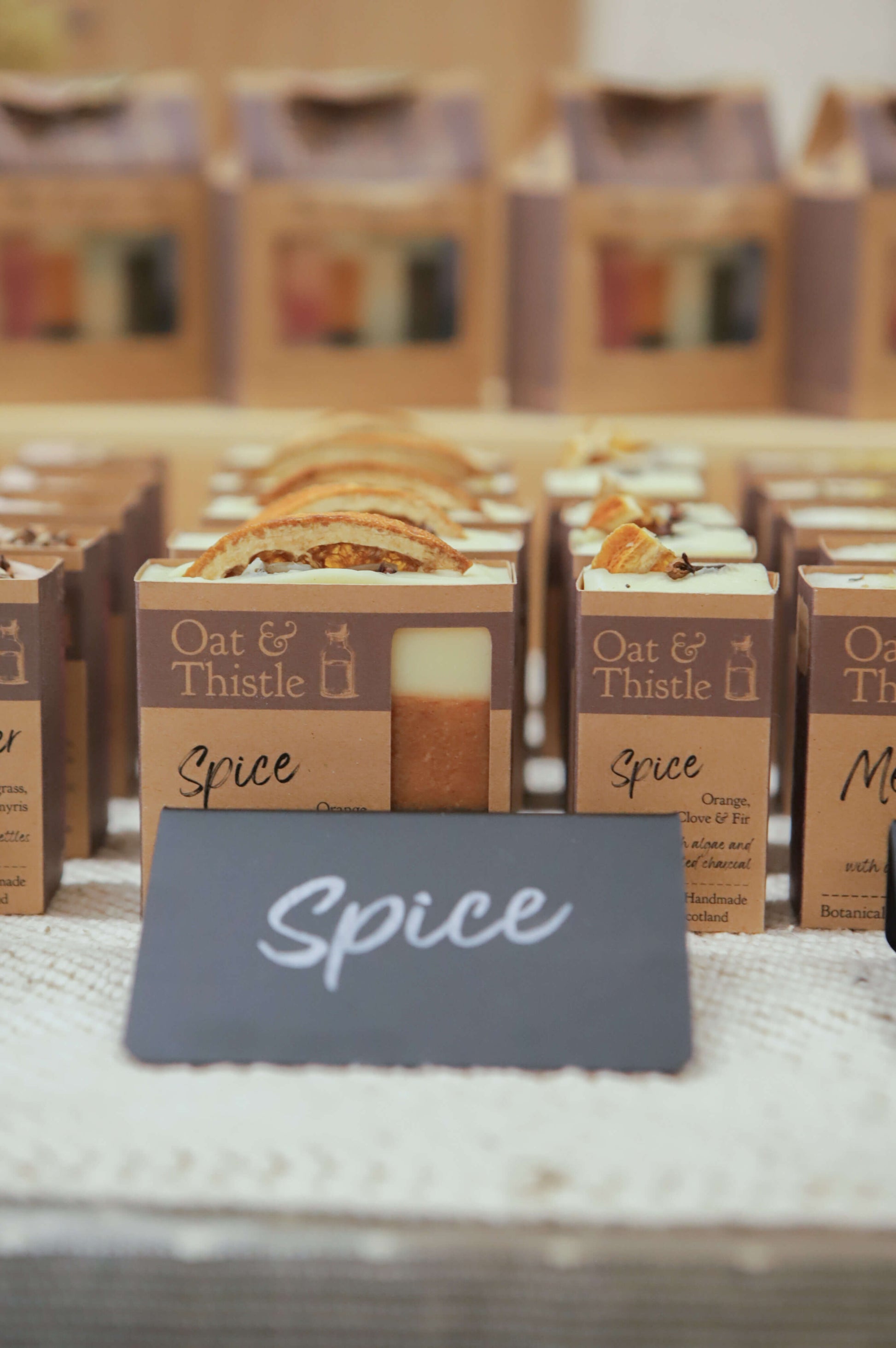Spice soap in packaging on market table