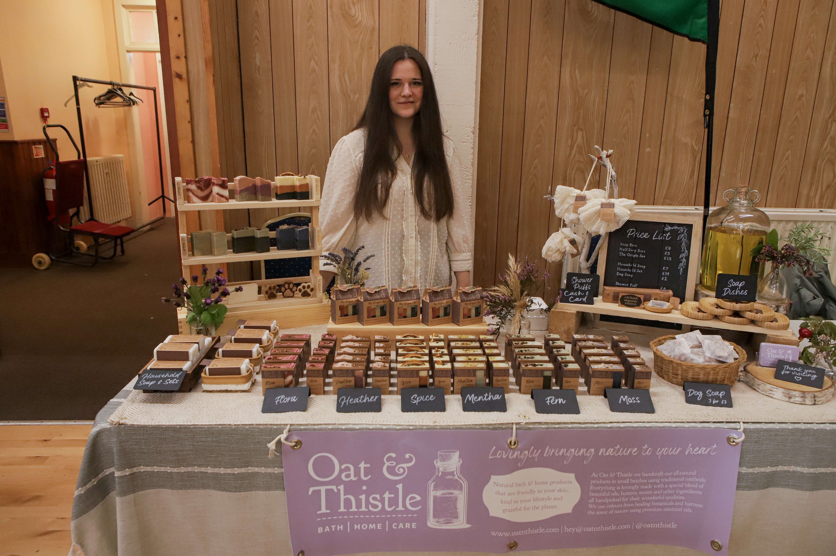 Anna (O&T owner) at our first market stall with our soaps and products set up