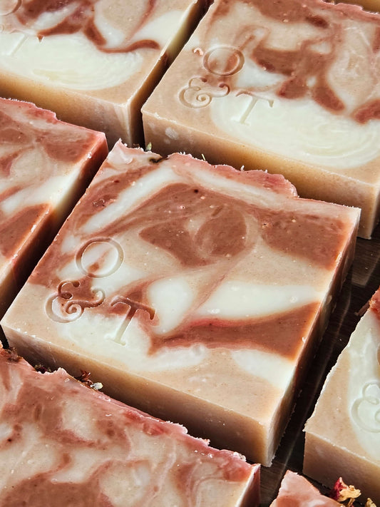 Large close up of flora soap bars with stamped logo