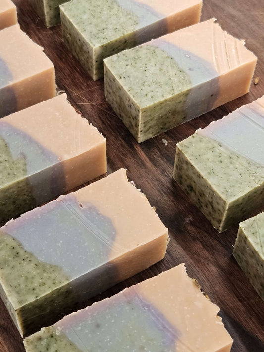 heather half soap bars, green light blue and pink, freshly card bars on dark wood worktop