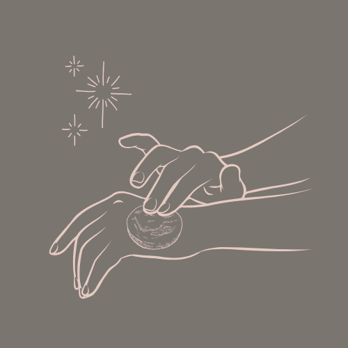 line drawing of lotion bar being used on hand