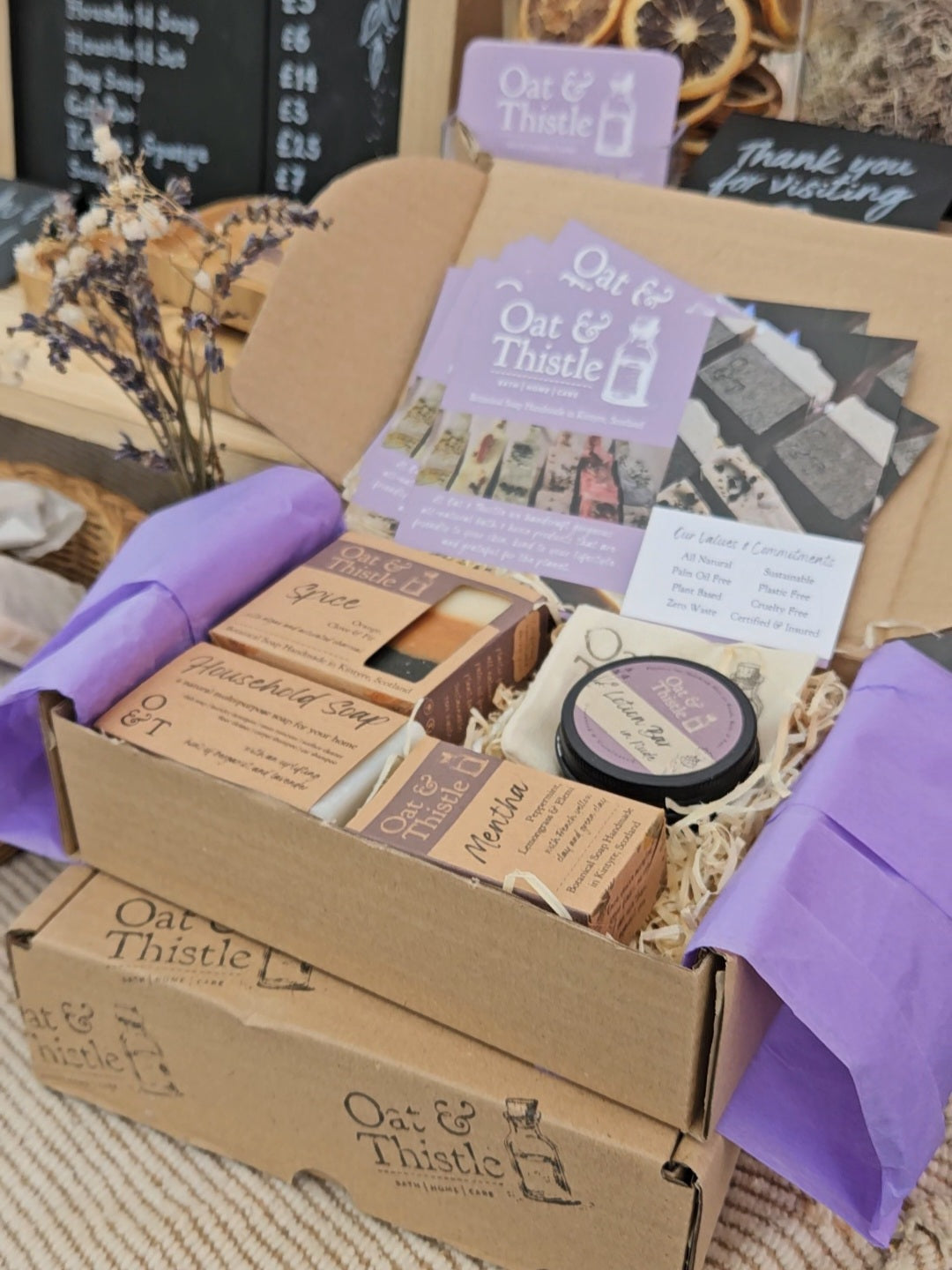 Kraft gift box with oat and thistle products in it
